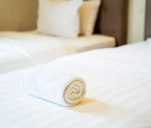 Bed with rolled towel